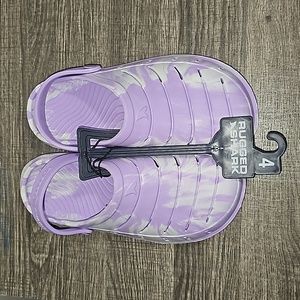 Purple and white clogs